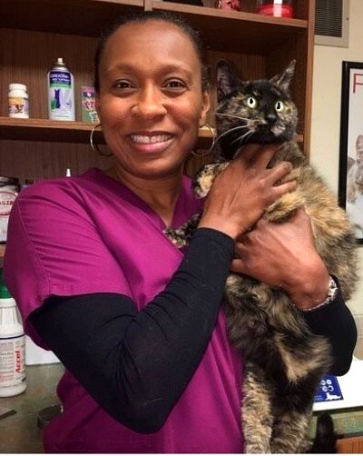 Doctor Dionne with Cat in Clinic
